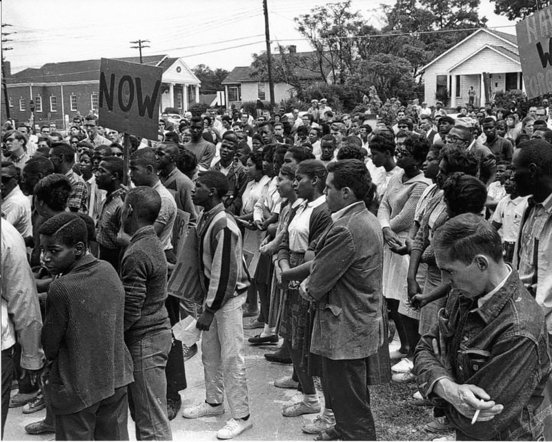 Demonstrators congregate at St. Joseph CME Church before a march.