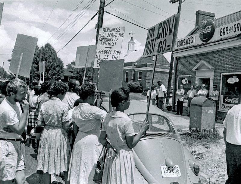 Marchers protesting segregated facilities.