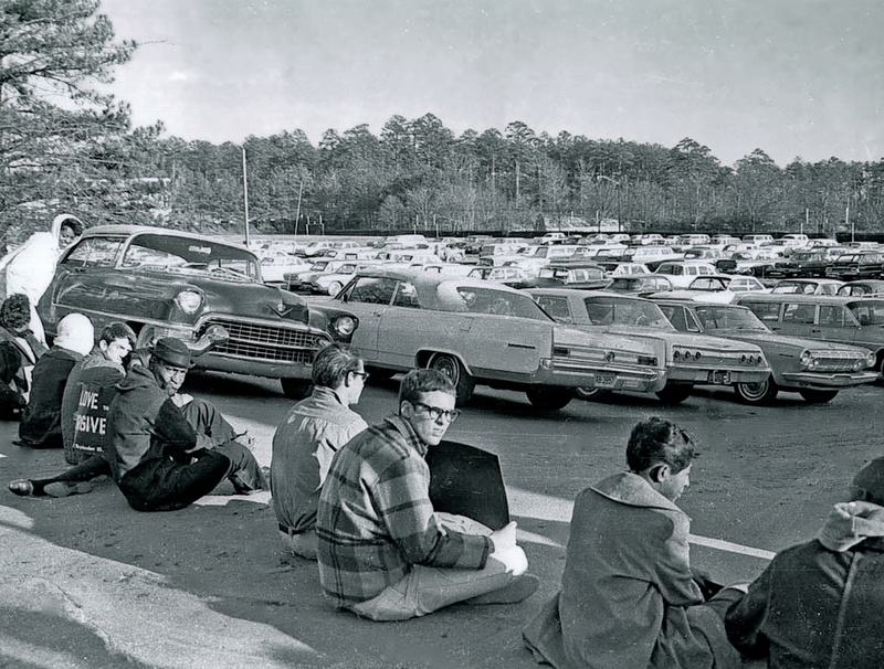 Sit-in at the exit of Woollen Gym parking lot
